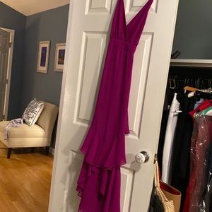 Fuscia color- maxi dress with spaghetti straps that crisscross in back.